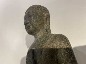 A Thai sandstone figure of Buddha, Khmer, Lopburi, 12/14th C.